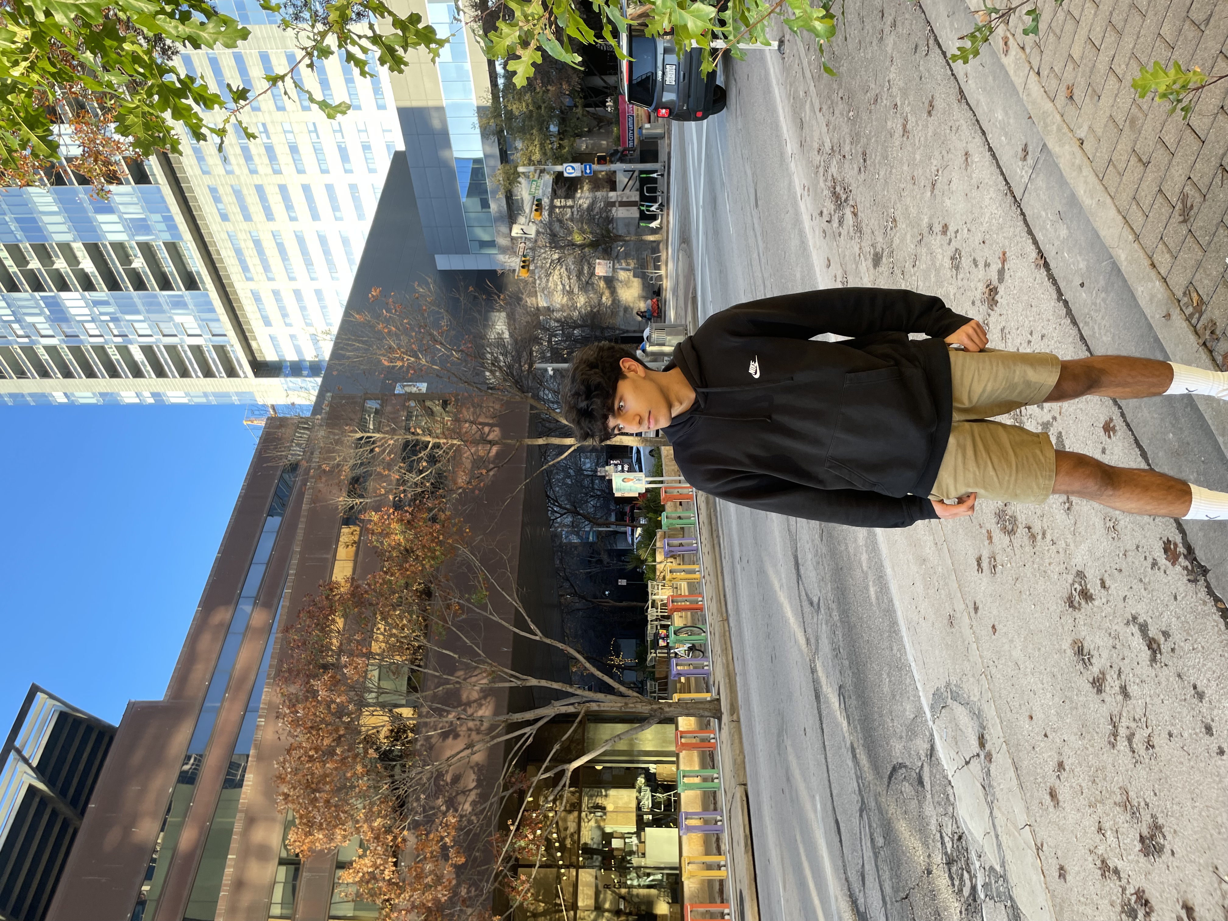 Image of Aarish Kodnaney running in the 2024 Hartford Marathon. You can see his untied shoe